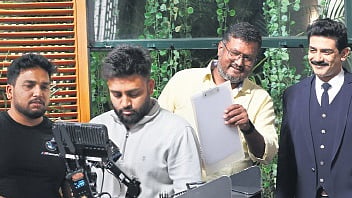 Dinakar Thoogudeepa along with the crew on the sets of Royal