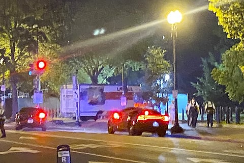 A BOX TRUCK IS SEEN CRASHED INTO A SECURITY BARRIER AT A PARK ACROSS FROM THE WHITE HOUSE, MAY 22, 2023