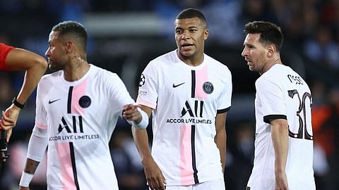 PSG forwards Neymar (L), Kylian Mbappe (C) and Lionel Messi look on during UCL match agianst Club Brugge at Jan Breydel Stadium in Bruges, on September 15, 2021. 