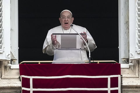 Pope Francis delivers his blessing as he recites the Angelus noon prayer from the window of his studio overlooking St Peter's Square, at the Vatican, Sunday, Jan 19, 2025.