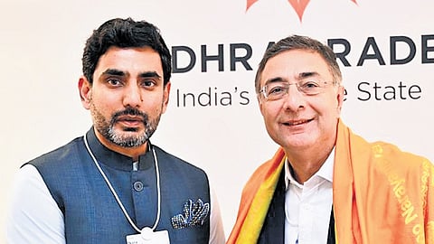 IT Minister Nara Lokesh with Temasek strategic head Ravi Lambah in Davos 
on Wednesday 