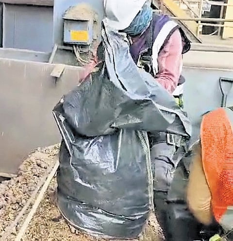 Workers incinerate contraband 