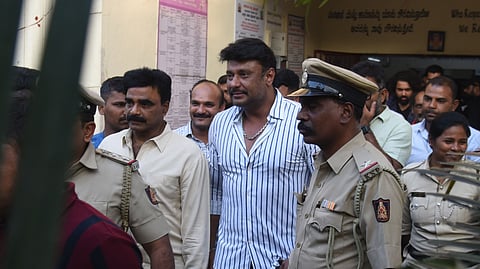 Actor Darshan arrives at the Subramanyanagar Police Station in Bengaluru.