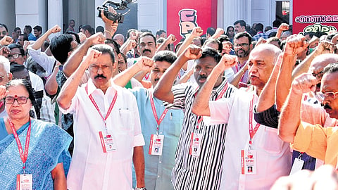 Senior CPM leaders P K Sreemathi, M V Govindan and Elamaram Kareem after the party flag was hoisted ahead of the CPM Ernakulam district conference 