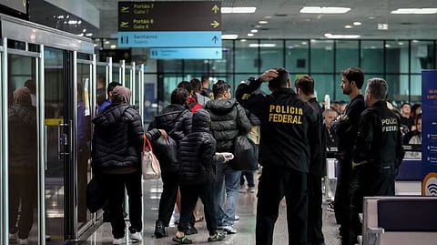 Brazilians who were deported from the US walk through the departure lounge at Eduardo Gomes International Airport in Manaus, Amazonas state, on January 25, 2025.