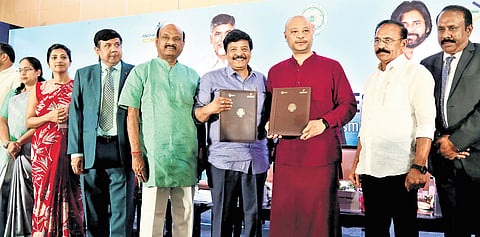 Tourism Minister Kandula Durgesh exchanging signed MoUs at the Regional Tourism Investors Conclave at Visakhapatnam on Monday 