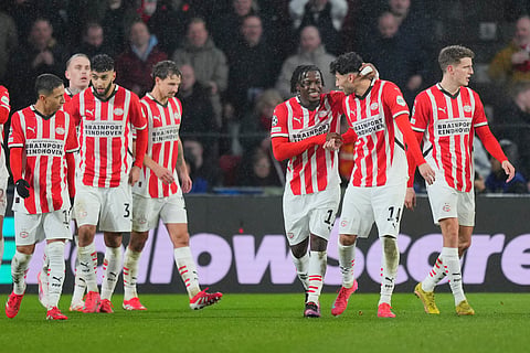 PSV players celebrate after a goal during the Champions League opening phase soccer match between PSV and Liverpool at Phillips Stadium in Eindhoven, Netherlands, Wednesday, Jan. 29, 2025. 