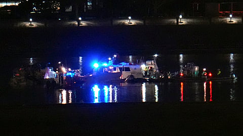Rescuer workers respond to the scene on the Potomac River near Ronald Reagan Washington National Airport, Thursday, Jan. 30, 2025, in Arlington, Va. 