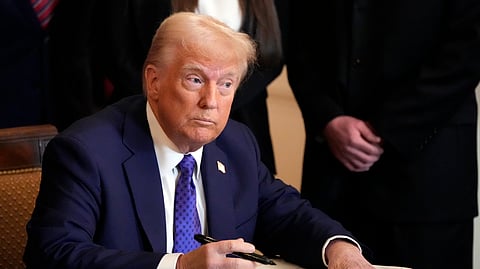 US President Donald Trump signs the Laken Riley Act during an event in the East Room of the White House, Wednesday, Jan. 29, 2025, in Washington. 