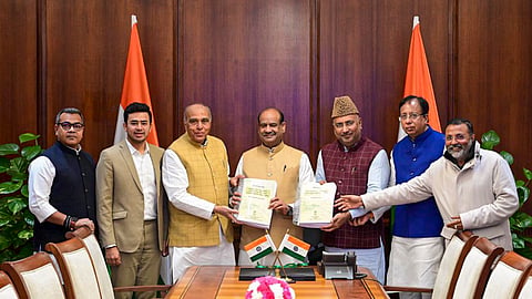  Members of the Joint Parliamentary Committee on Waqf Amendment Bill headed by its Chairman Jagdambika Pal during the submission of its report to Lok Sabha Speaker Om Birla, at the Parliament House, in New Delhi.