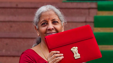 Union Finance Minister Nirmala Sitharaman upon her arrival at the Parliament House complex to present the Union Budget 2025-26, in New Delhi, Saturday, Feb. 1, 2025.