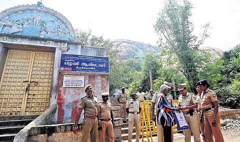 Police deployed in front of the path that leads to the dargah