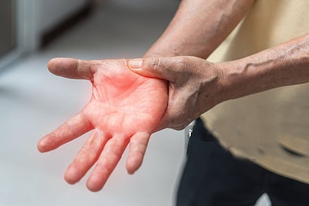Symptoms of GBS include tingling and numbness, often starting in the feet, muscle weakness and pain, and difficulty walking.