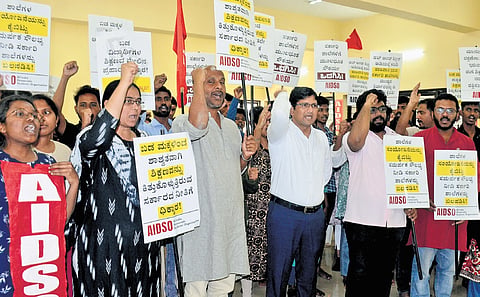 Members of AIDSO protest the state government’s decision to shut down more than 4200 government schools in Bengaluru on Tuesday 