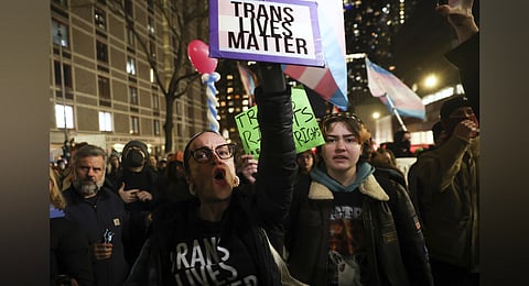 Trump also signed orders that set up new rules about how schools can teach about gender and that intend to ban transgender athletes from participating in girls' and women's sports.