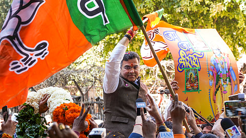 BJP candidate from New Delhi assembly constituency Parvesh Verma celebrates outside a counting center after claiming victory in the Delhi Assembly polls amid the counting of votes, in New Delhi, Saturday, Feb. 8, 2025.