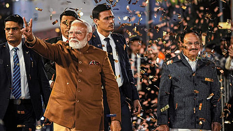 BJP leaders and workers celebrate the thumping victory of the party in the Delhi Assembly elections. 