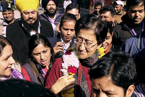 Delhi CM Atishi after winning her seat over BJP's Ramesh Bidhuri in Assembly elections, in New Delhi, Saturday, Feb. 8, 2025. 