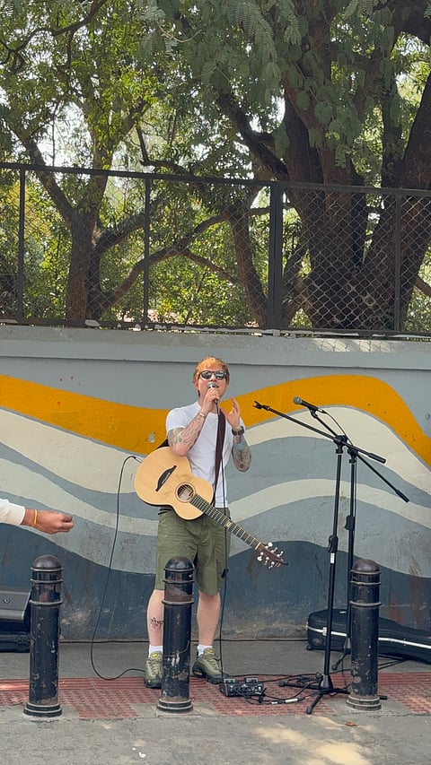 Ed Sheeran performs on Church Street