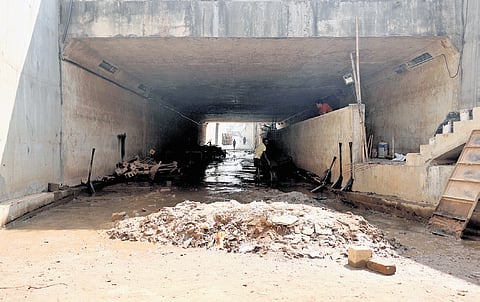 The subway near Chromepet railway station has remained under construction for years, with debris piled up and water stagnating throughout 