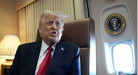 President Donald Trump speaks to reporters aboard Air Force One where Trump signed a proclamation declaring Feb. 9 "the first ever Gulf of America Day," as he travels from West Palm Beach, Fla. to New Orleans, Sunday, Feb. 9, 2025. 