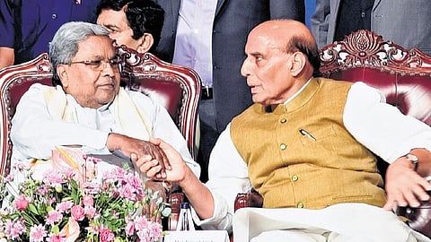 Chief Minister Siddaramaiah (L) and Defence Minister Rajnath Singh at the launch of the Global Investors’ Meet in Bengaluru on Tuesday 