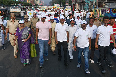 Students take part in a traffic awareness rally organised by the district transport department where NTR district collector G Lakshmisha, VMC commissioner Dhyanchandra also present in Vijayawada on Tuesday. 