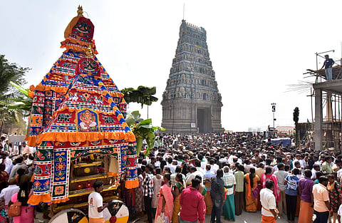 Devotees pulling the temple car on the occasion of ``Thai Poosam at Marudhamalai Subramaniaswamy Temple in Coimbatore on Tuesday.