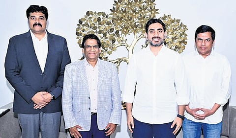 Minister for HRD and IT Nara Lokesh with Sify Technologies Chairman and Managing Director Raju Vegesna.