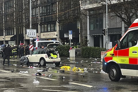 Emergency services attend the scene of an accident after a driver hit a group of people in Munich, Germany, Thursday, Feb 13, 2025.