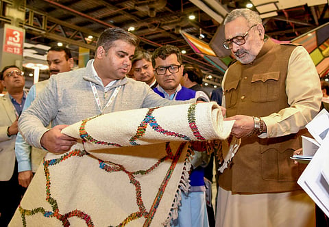  In this image released by PIB on Feb. 14, 2025, Union Minister of Textiles Giriraj Singh and Union Minister of State for External Affairs and Textiles Pabitra Margherita during a visit to Bharat Tex 2025 at the Bharat Mandapam, in New Delhi.