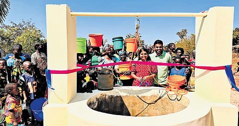 Arun and his wife Sumi along with villagers near a ‘Kerala model’ well in Malawi, Africa