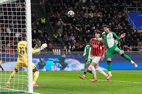 Feyenoord's Julian Carranza scores his side's first goal during Champions League, playoff second leg soccer match between AC Milan and Feyenoord, at the San Siro stadium in Milan, Italy, Tuesday, Feb.18, 2025. 