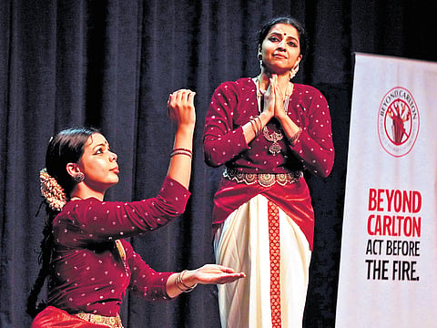 Dancer Matangi Prasan (standing)performs ‘Agni: Respect and Neglect’, a  Bharatanatyam performance during the memorial event of Carlton Towers fire on Saturday