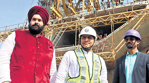 Minister Parvesh Verma inspects Barapullah elevated road project that connects Mayur Vihar to Sarai Kale Khan on Saturday.