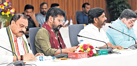 TPCC chief B Mahesh Kumar Goud, Chief Minister A Revanth Reddy, Deputy Chief Minister Mallu Bhatti Vikramarka at a meeting 
on caste survey with BC leaders at Praja Bhavan in Hyderabad