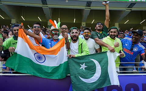 Cricket fans at the Dubai International Cricket Stadium ahead of the Champions Trophy 2025 cricket match between India and Pakistan, in Dubai, Sunday, Feb. 23, 2025. 