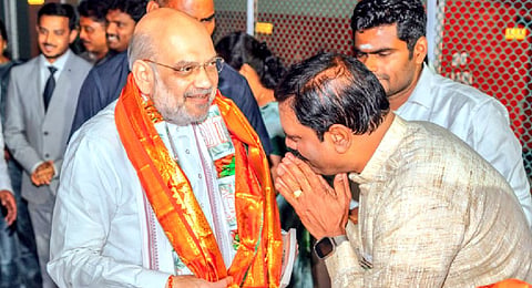 Union Home Minister Amit Shah being received by BJP leaders as he arrive at Coimbatore for inaugration of BJP party offices in Tamil Nadu. 