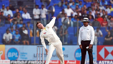 In this photo from March 1, 2023, Australia's Matthew Kuhnemann bowls during the first day of the third Test match against India at Holkar Cricket Stadium in Indore.