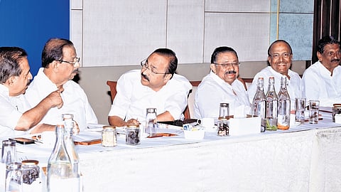 Senior Congress leader Ramesh Chennithala, party state president K Sudhakaran and Leader of Opposition V D Satheesan engage in a conversation during the UDF meeting in Kochi on Thursday. 