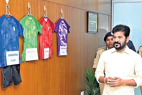 Chief Minister A Revanth Reddy reviews designs of school uniforms at the Integrated Command and Control Centre (ICCC) on Saturday 