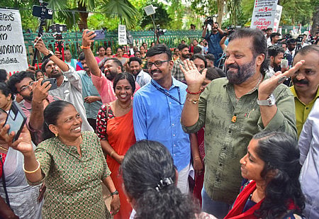 Union Minister of State for Petroleum and Tourism Suresh Gopi makes dance moves with Members of Kerala ASHA Health Workers Association during their indefinite protest.