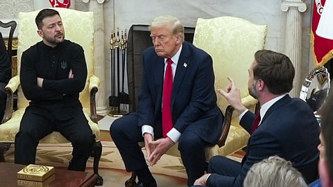 Vice President JD Vance, right, speaks with Ukrainian President Volodymyr Zelenskyy, left, as President Donald Trump listens in the Oval Office at the White House, Friday, Feb. 28, 2025, in Washington. 
