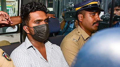FILE | Afan, the accused in the Venjaramoodu mass murder case, being escorted to Poojappura Central jail. 