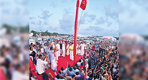 Finance Minister K N Balagopal hoisting the CPM flag at Ashramam Ground in Kollam on Wednesday