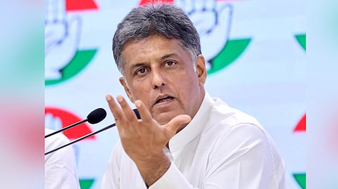 Congress MP Manish Tewari addresses the press at party headquarters in New Delhi.