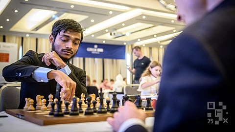 Grandmaster Aravindh Chithambaram (L) during his game with David Navara of Czech Republic at the Prague Masters tournament 