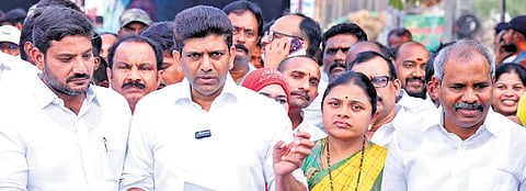 Union Minister of State for Rural Development and Communications Dr Pemmasani Chandrasekhar speaking to presspersons after inaugurating the triple-railway bridge at Srinivasa Nagar, Donka Road