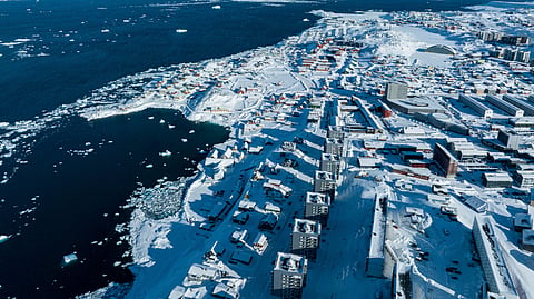 Houses covered by snow are seen in Nuuk, Greenland, Wednesday, March 5, 2025. 