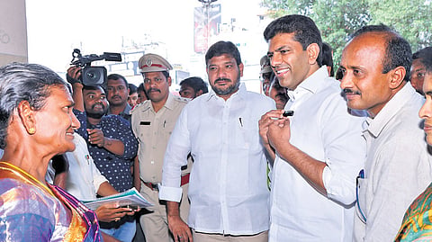 Union Minister Pemmasani Chandrasekhar inspecting amenities, and interacting with passengers at NTR Bus Stand in Guntur on Sunday 